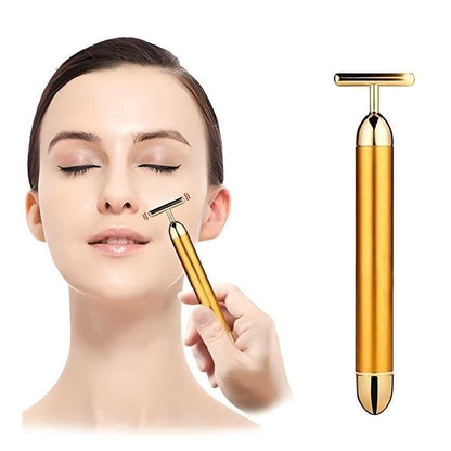 Gold facial T-bar roller being used on woman’s face demonstrating the best facial roller for skin tightening
