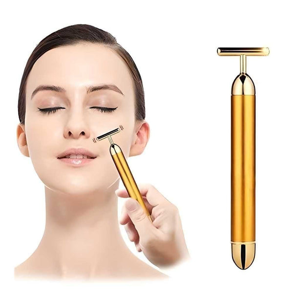 Gold facial T-bar roller being used on woman’s face demonstrating the best facial roller for skin tightening